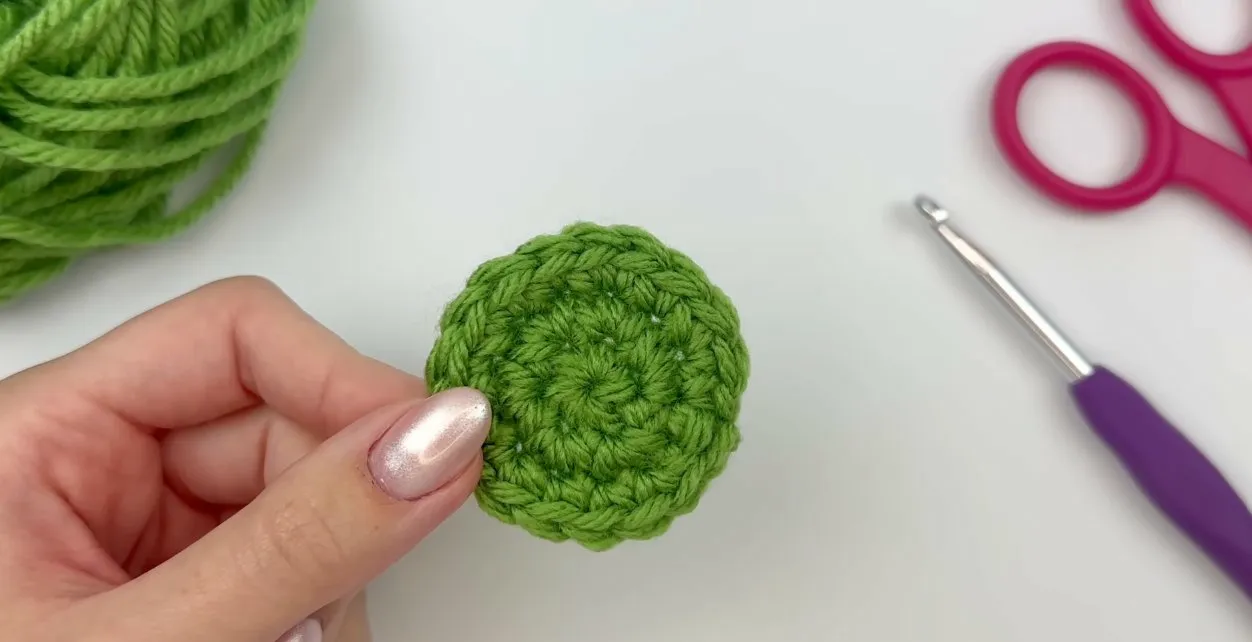 Finished green crochet circle with no hole in the center