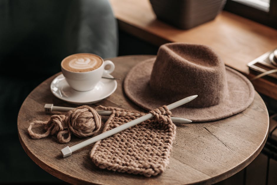 cozy crochet hat and yarn on a rustic table perfect for learning how to crochet a hat
