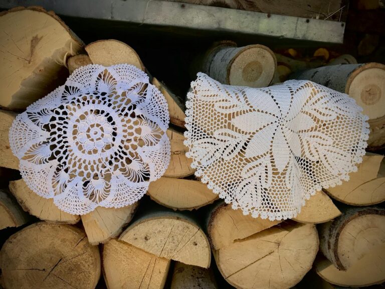 Beautiful crochet doily patterns displayed on a rustic wooden surface