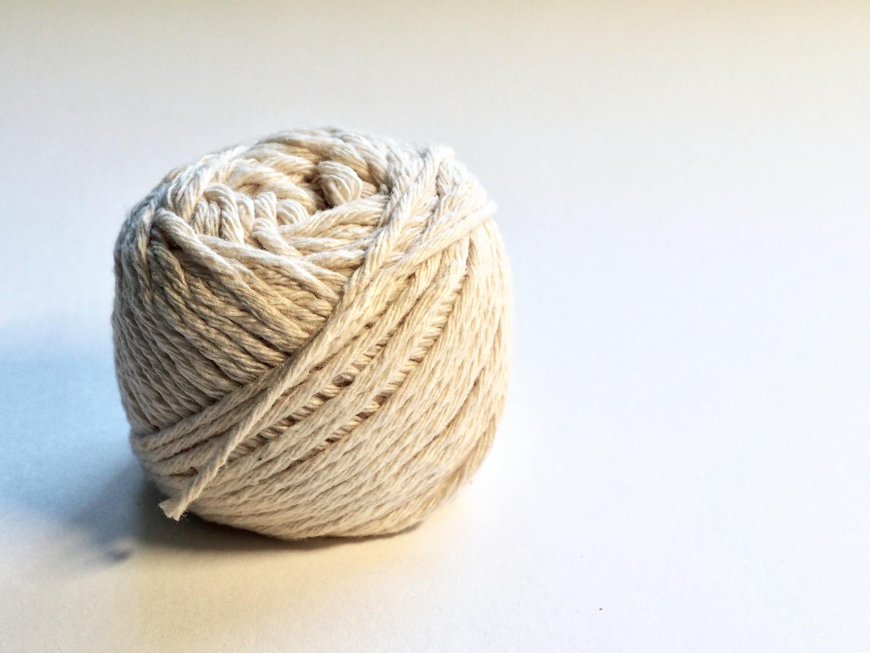 cotton yarn balls for crocheting a dish towel with hanging loop