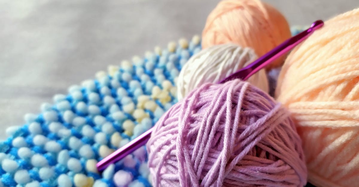 Crochet hook with colorful yarn for making crochet washcloths