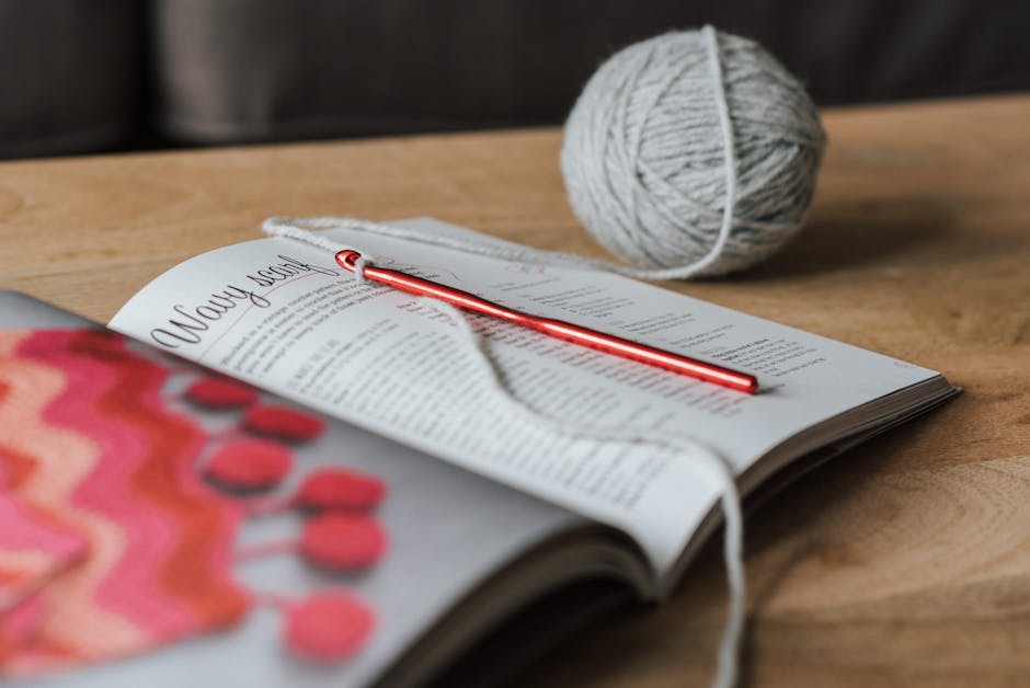 how to crochet a mushroom with yarn and crochet supplies arranged on table
