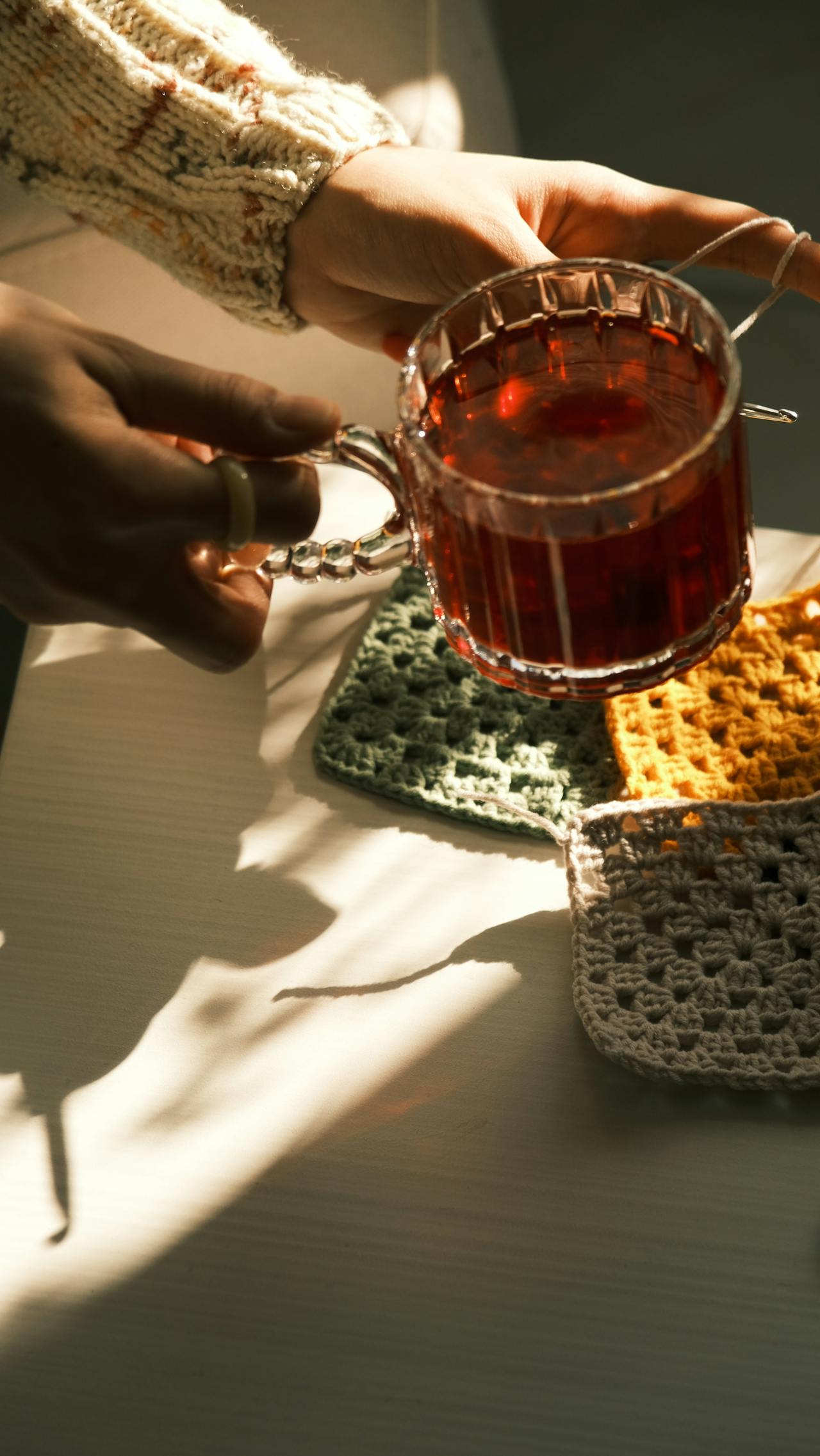 Complete set of handmade granny square coasters pattern designs in various seasonal colors