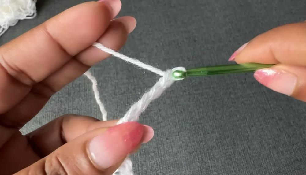 Working the foundation double crochet row for this crochet top pattern