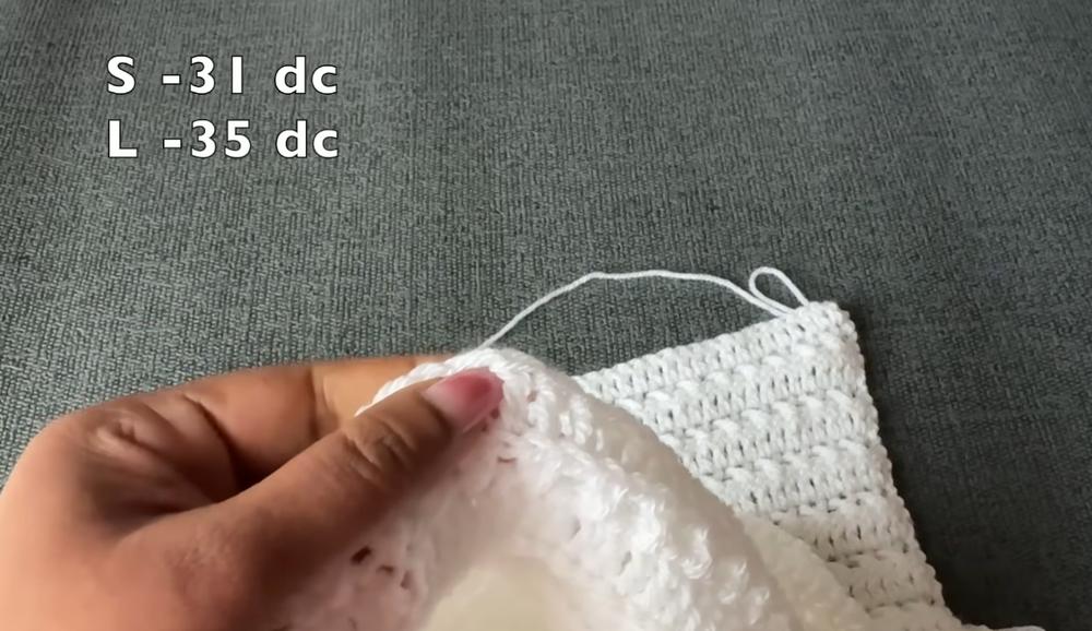 Working the cross V stitch row for this crochet top pattern