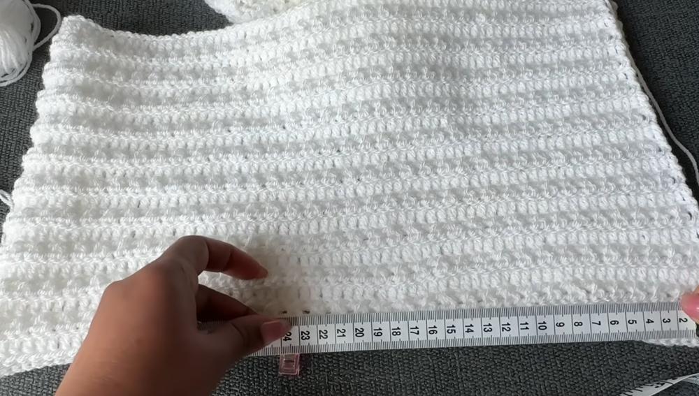 Continuing to repeat the cross V stitch rows for this crochet top pattern