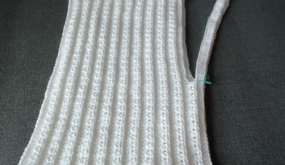 Working the neck edging slip stitch rounds for this crochet top pattern