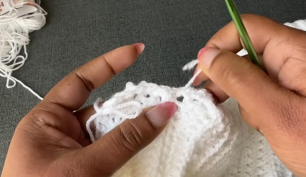 The completed cross V stitch crochet top pattern worn and styled