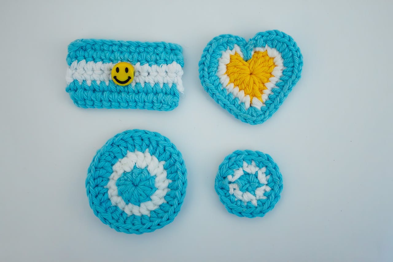 colorful crochet star pattern motifs and crochet patterns on a flat surface
