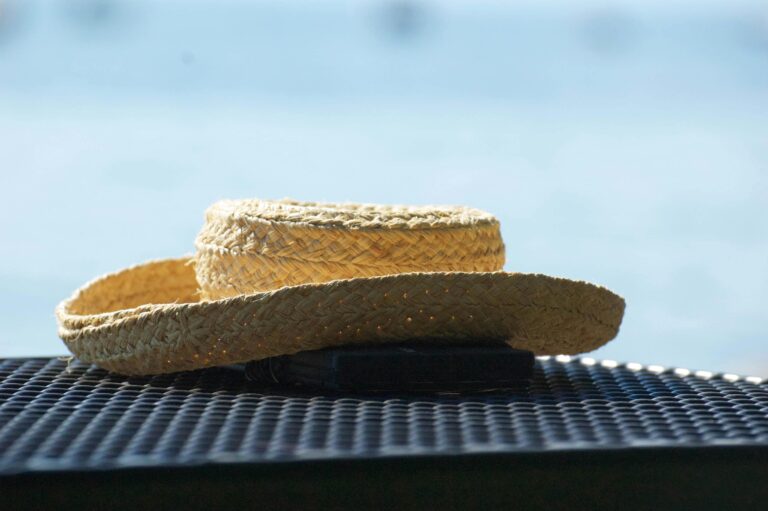 crochet sun hat with brim for beginners on a black table