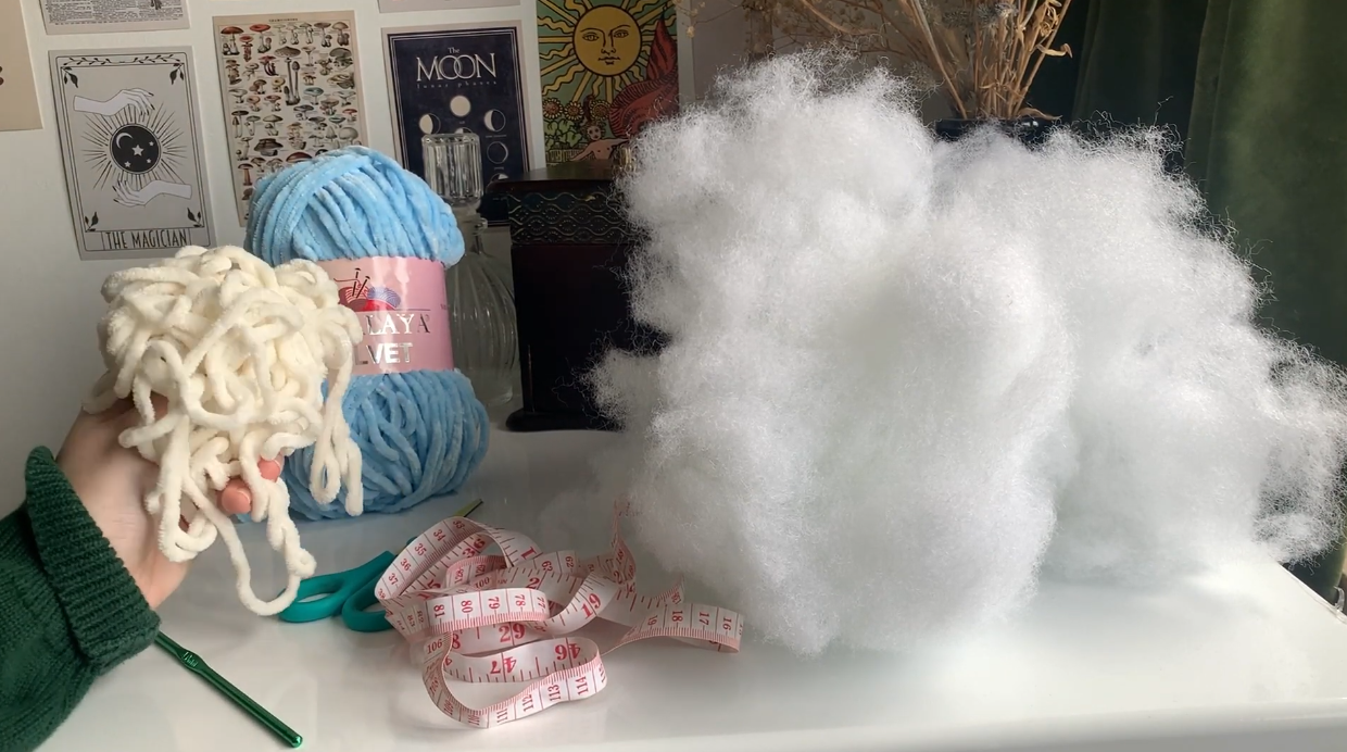 velvet yarn and materials for crochet pillow project