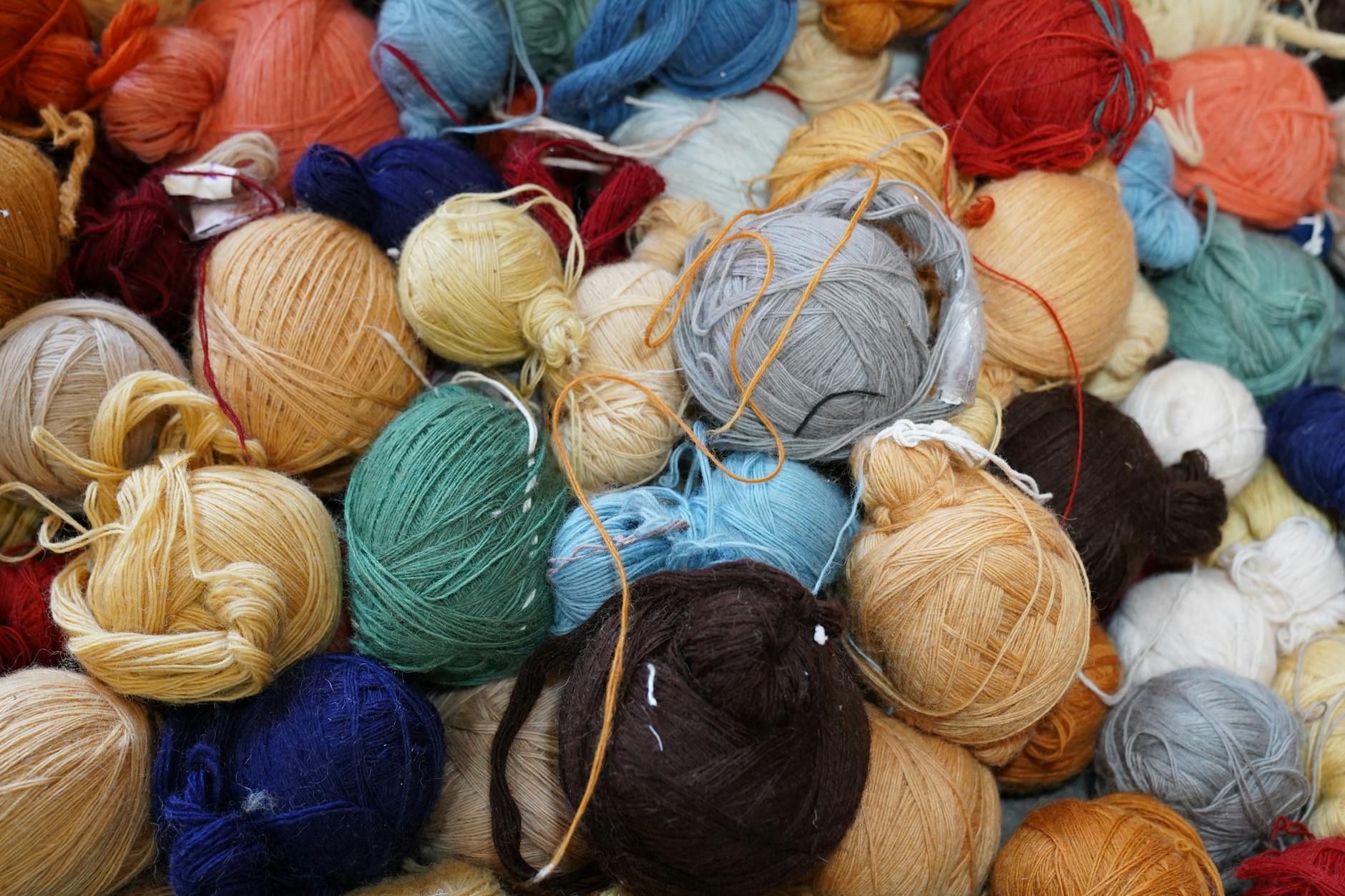 Detailed view of a colorful crochet piece highlighting clean color changes in crochet throughout a multi-stripe design