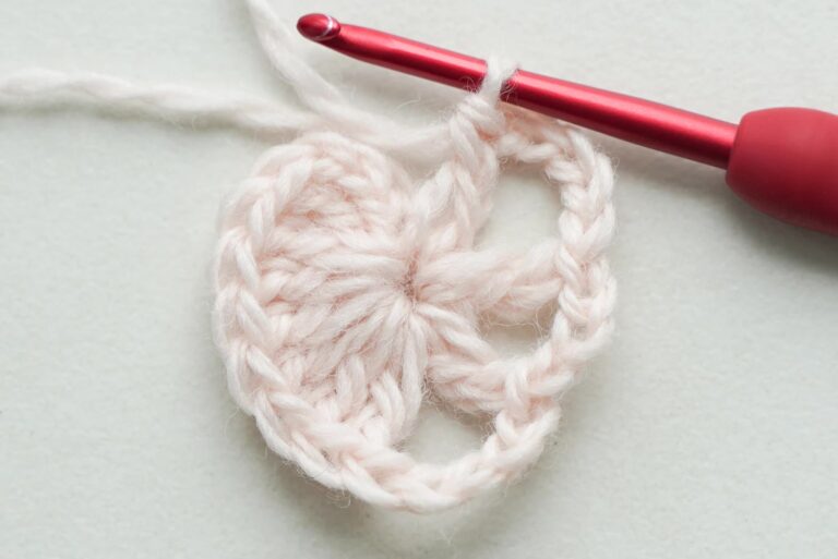 Skull granny square crochet pattern with a skull motif centered in a classic granny square border