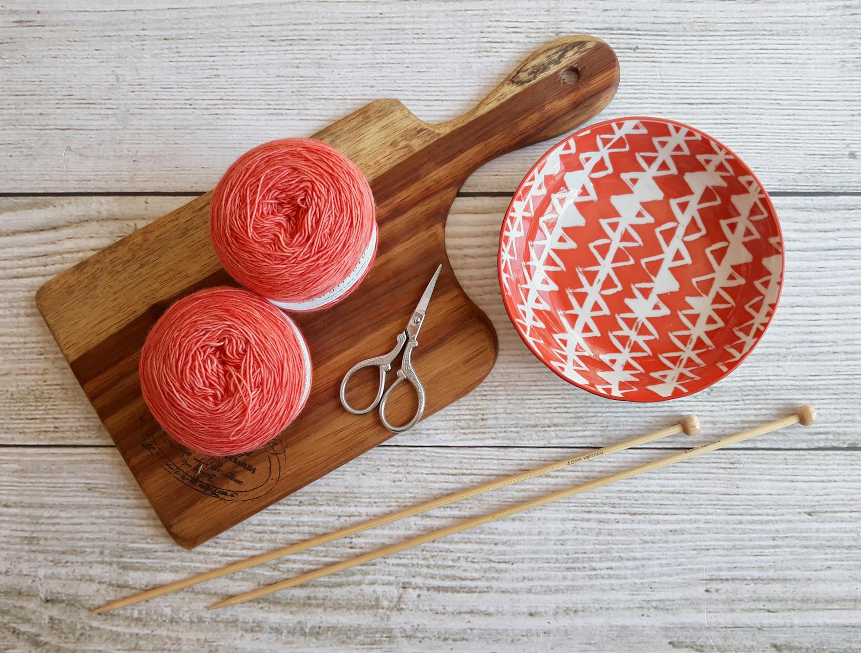 crochet summer top featured image with colorful yarn and crochet tools flat lay