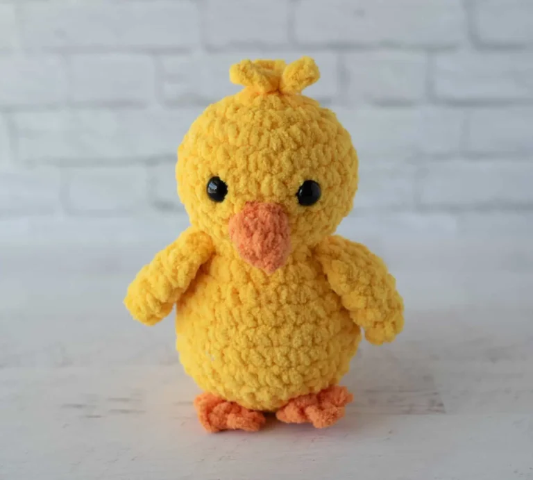chick crochet pattern amigurumi made with yellow chenille yarn and orange beak