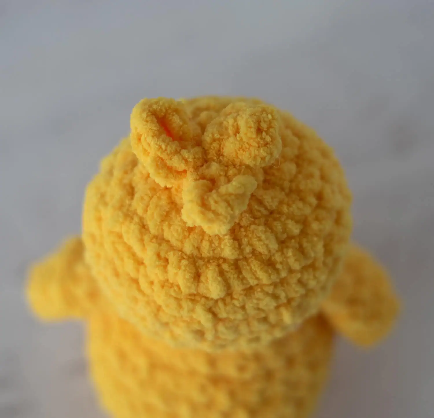 Top feathers detail for chick crochet pattern amigurumi