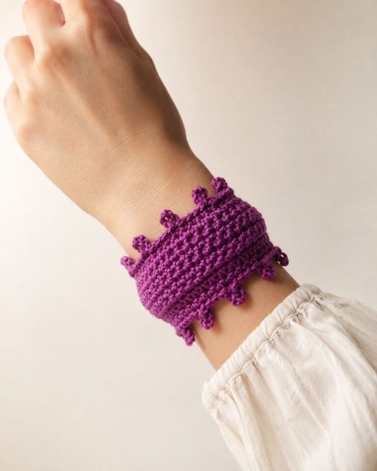 Crochet bracelet patterns: wide purple cuff bracelet with scalloped edges