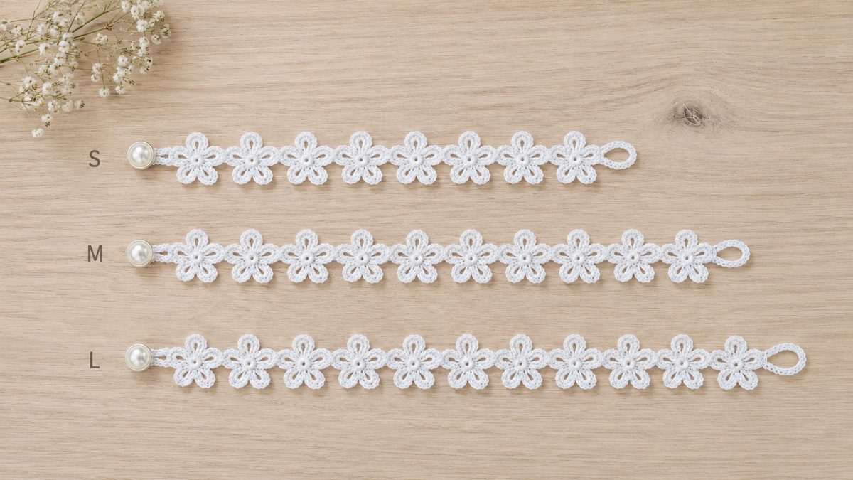 Three crochet flower bracelet sizes, small medium and large side by side