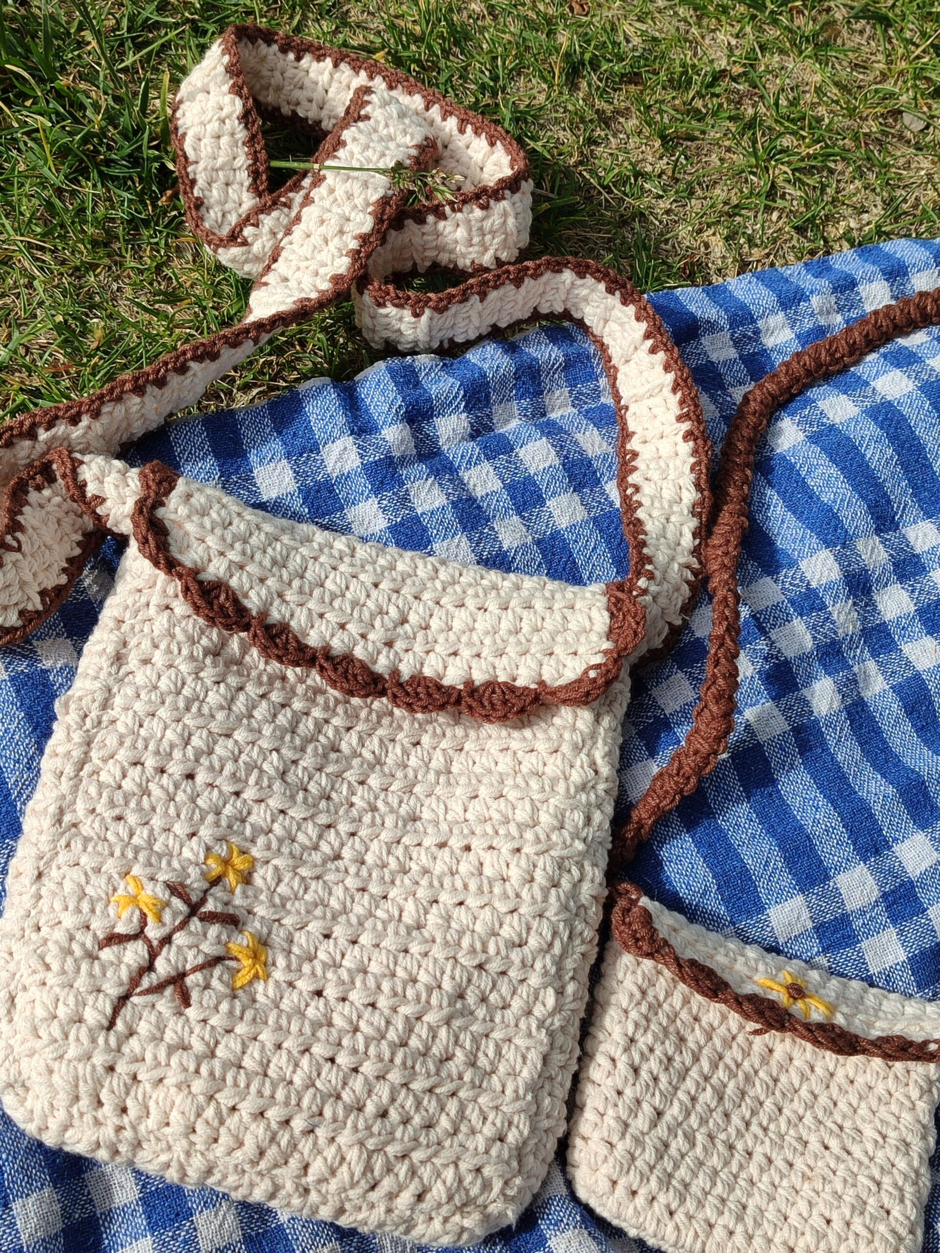 Floral crochet bag on blanket