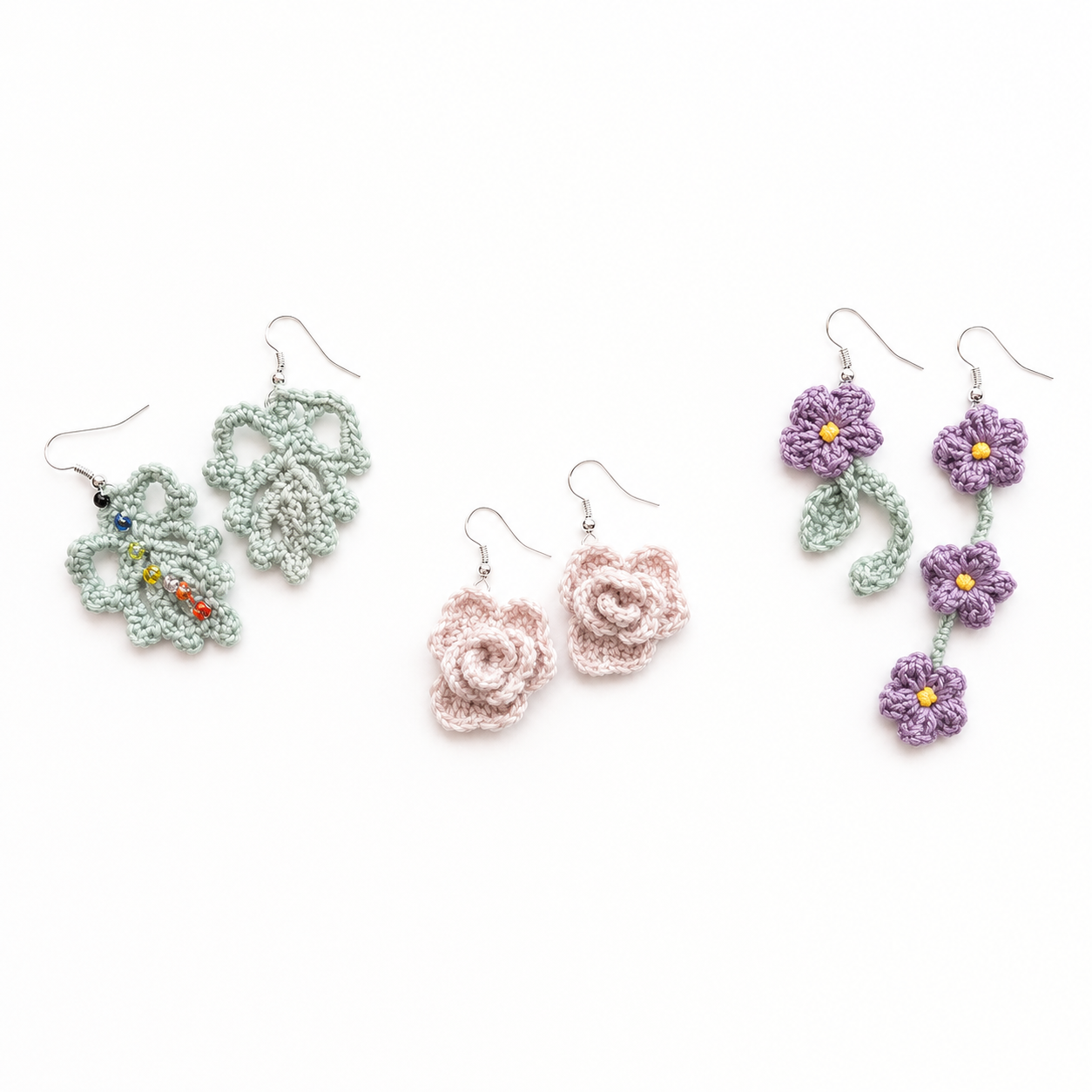 Three pairs of crochet flower drop earrings