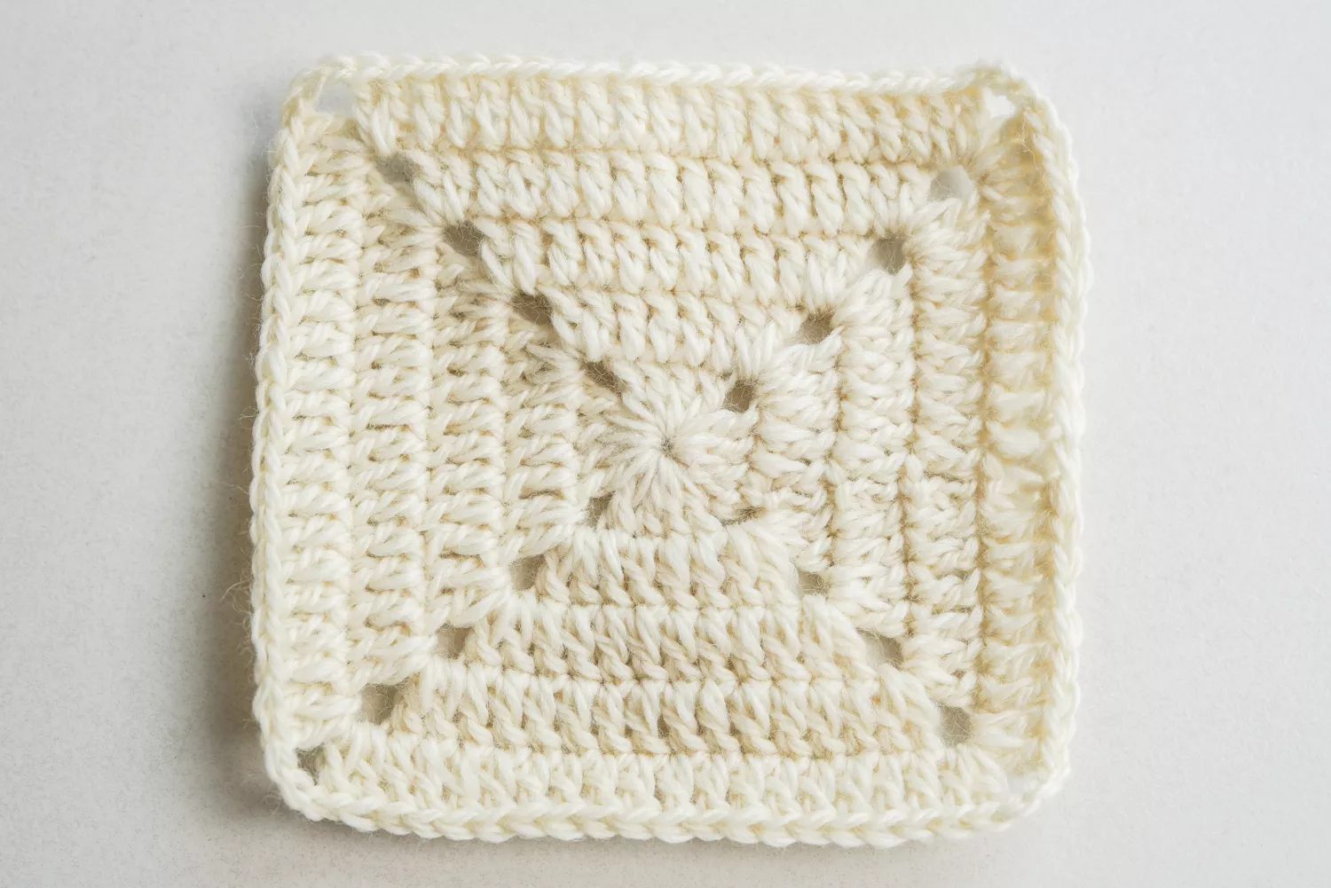 Tulip granny square background round 5 completed ready for assembly