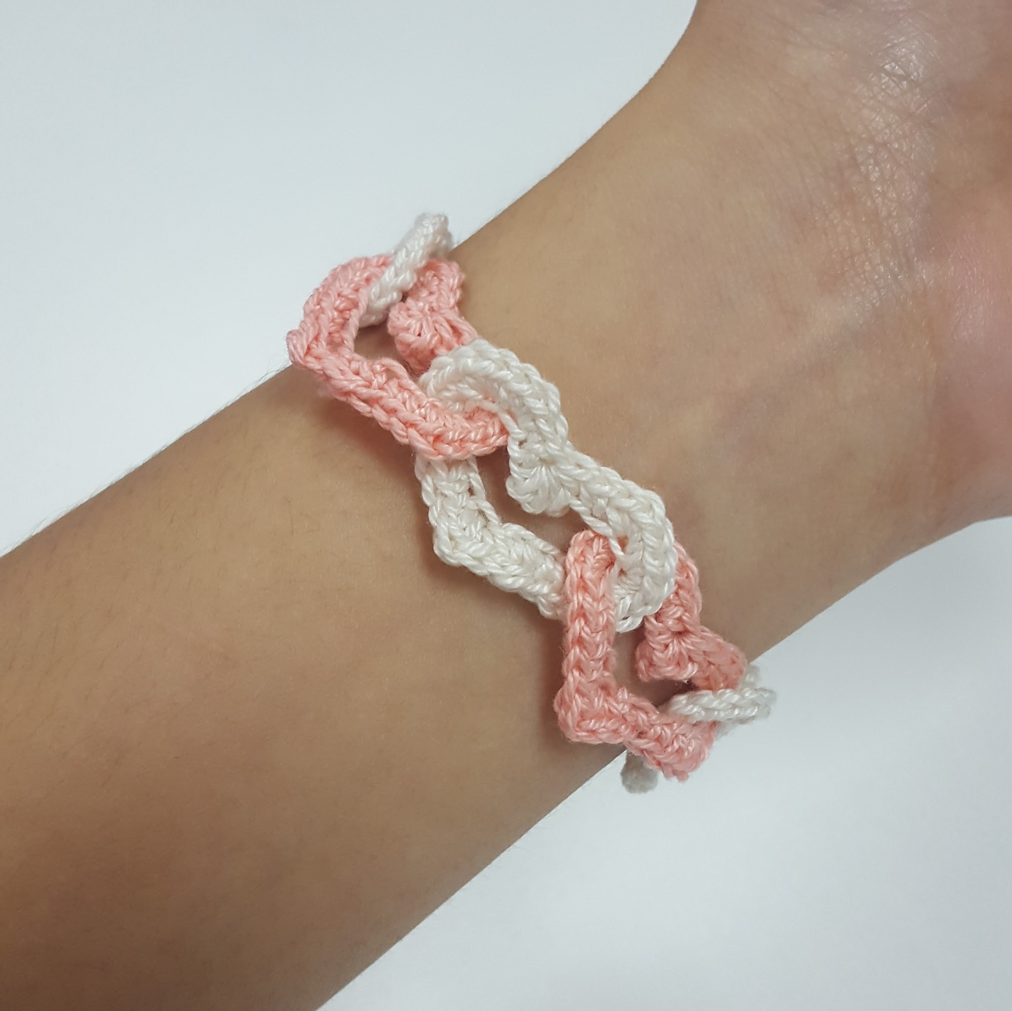linked hearts crochet bracelet finished project worn on wrist