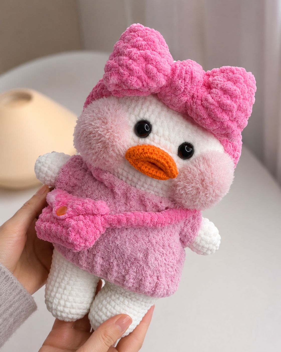 Lala Fanfan duck crochet pattern in white and pink with bow hat dress and sling bag