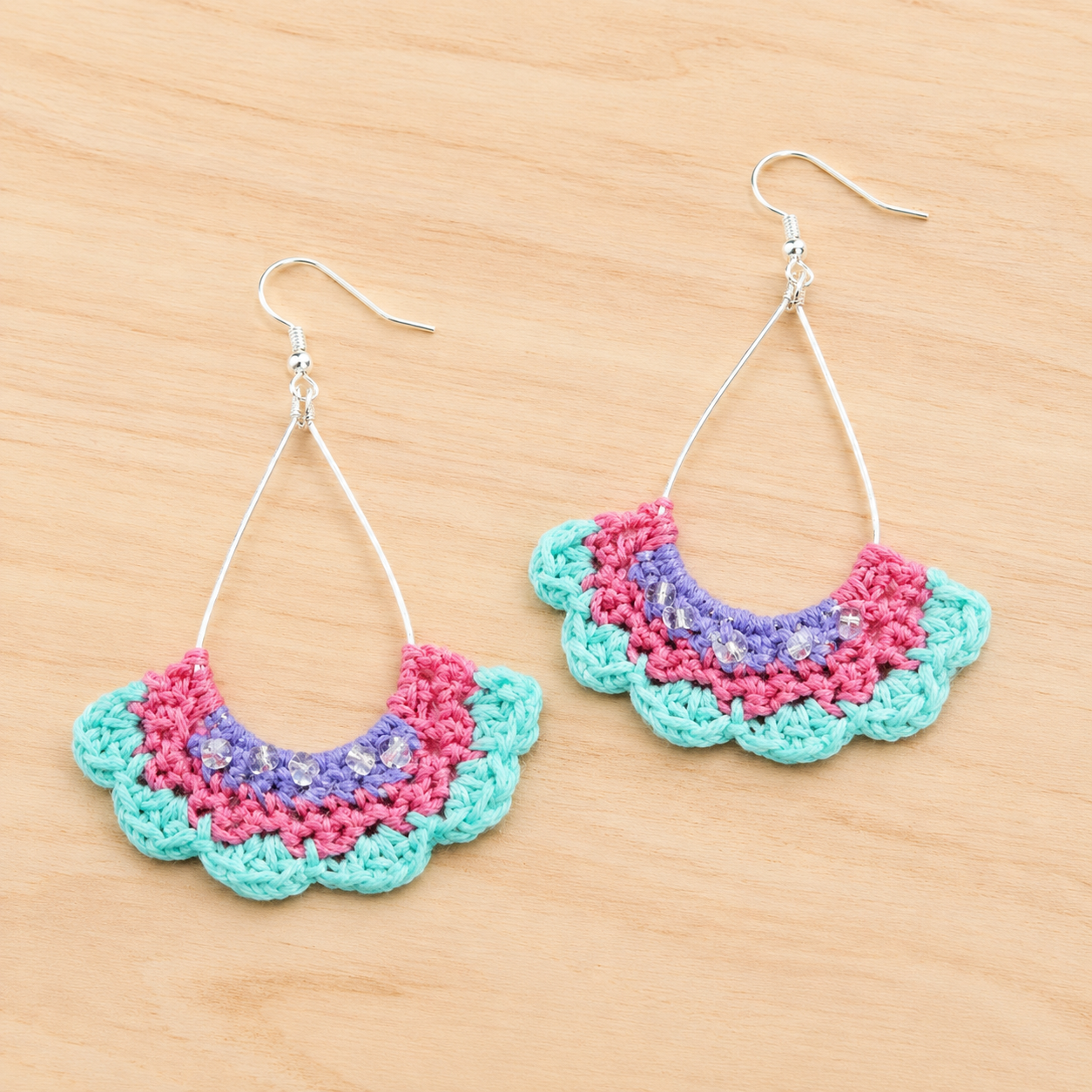 Crochet scalloped dangle earrings in teal pink and purple