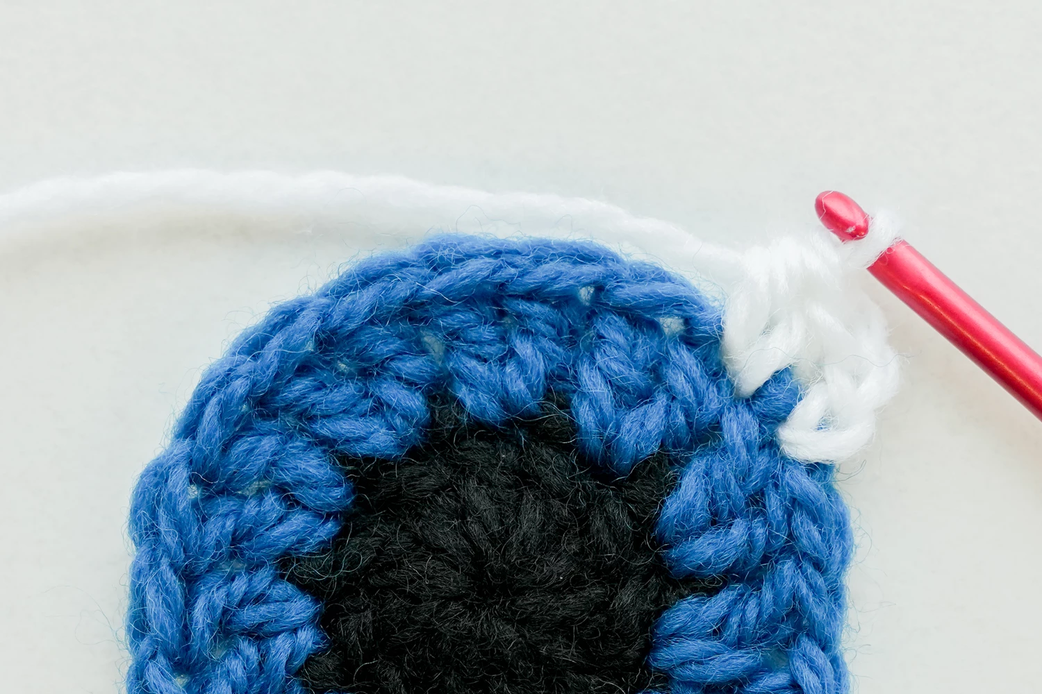 Devil Eye Granny Square Round 3 complete - white sclera layer