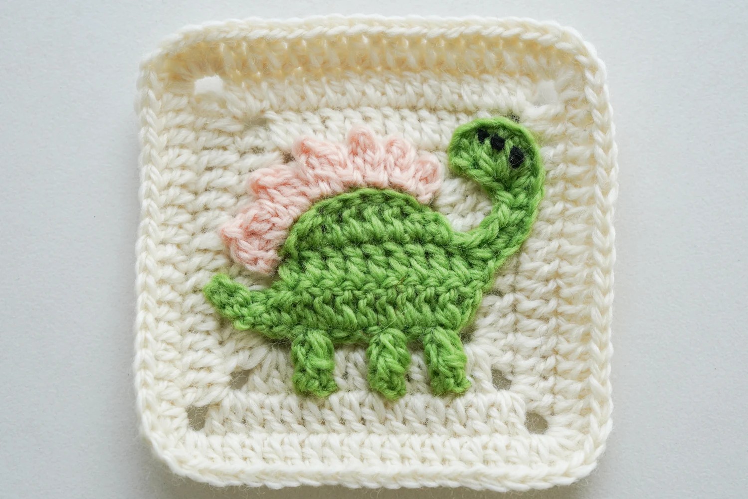 Dinosaur granny square facial details eye and mouth