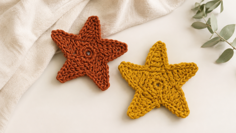 Three handmade five-point crochet star appliques