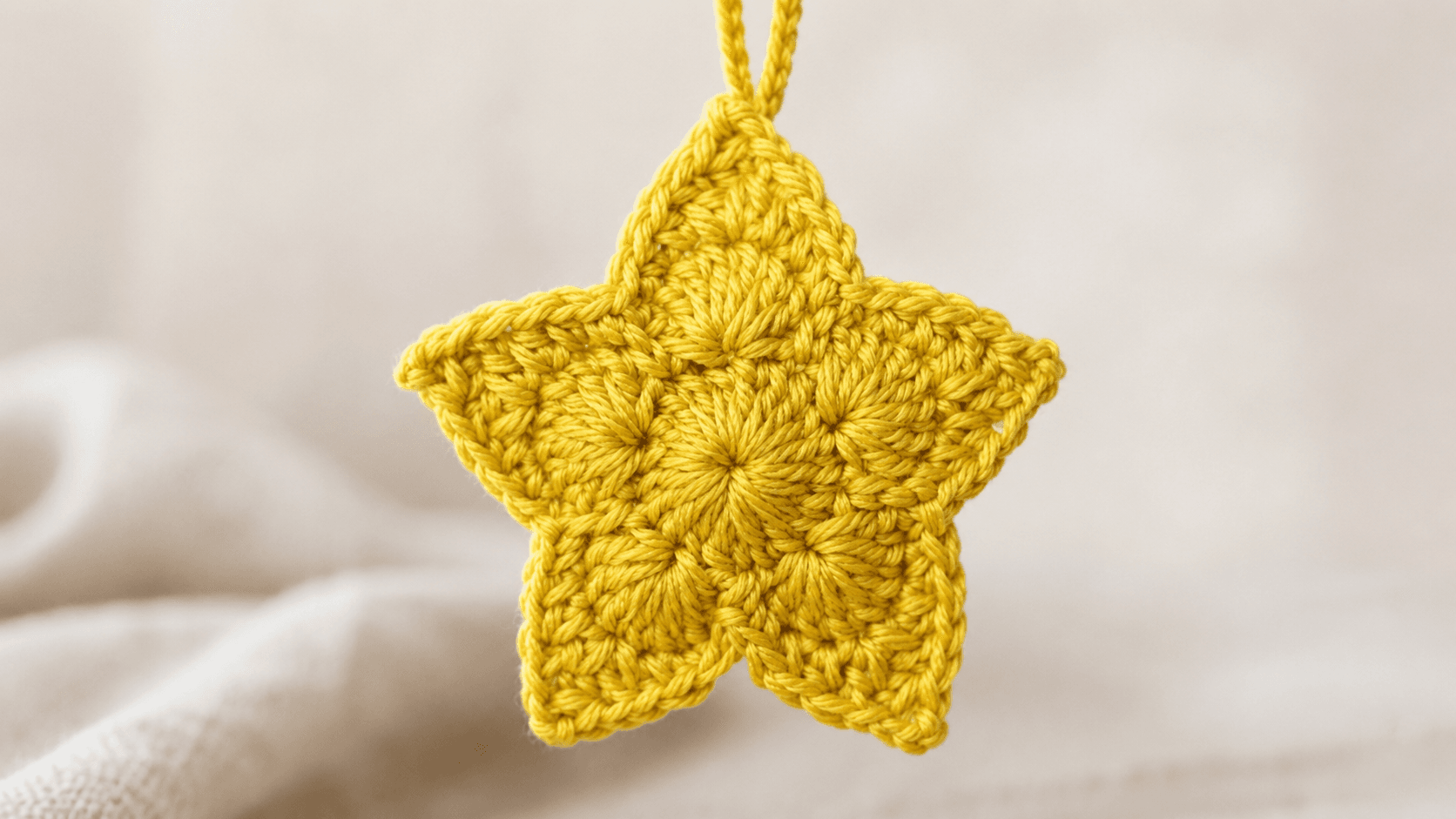 Yellow handmade crochet star keychain