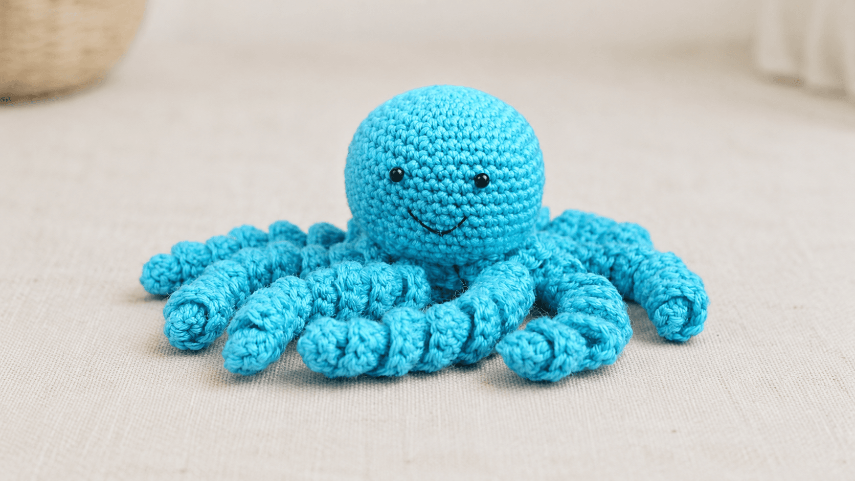 Blue crocheted octopus amigurumi toy