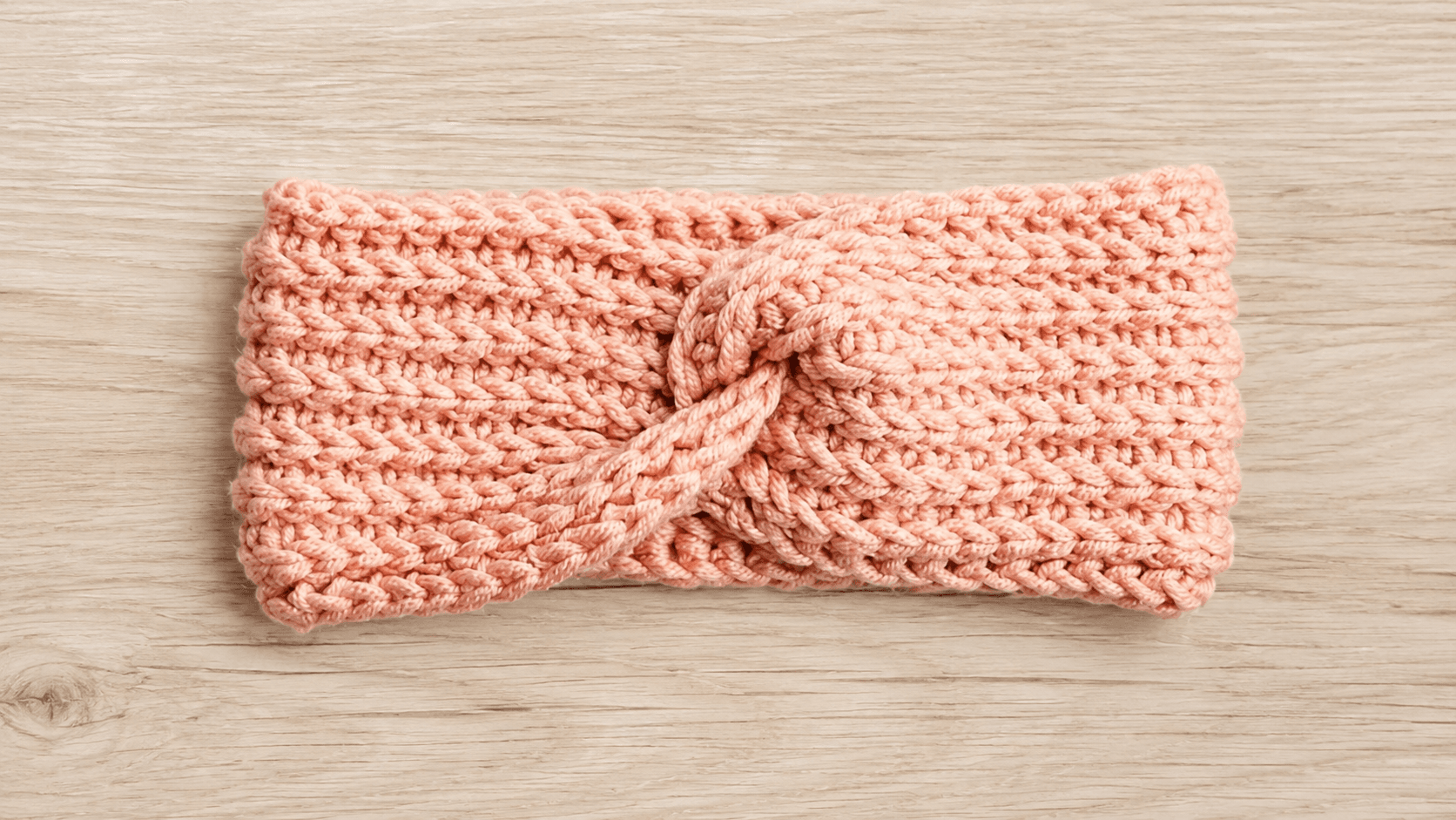 Peach twisted crocheted ear warmer