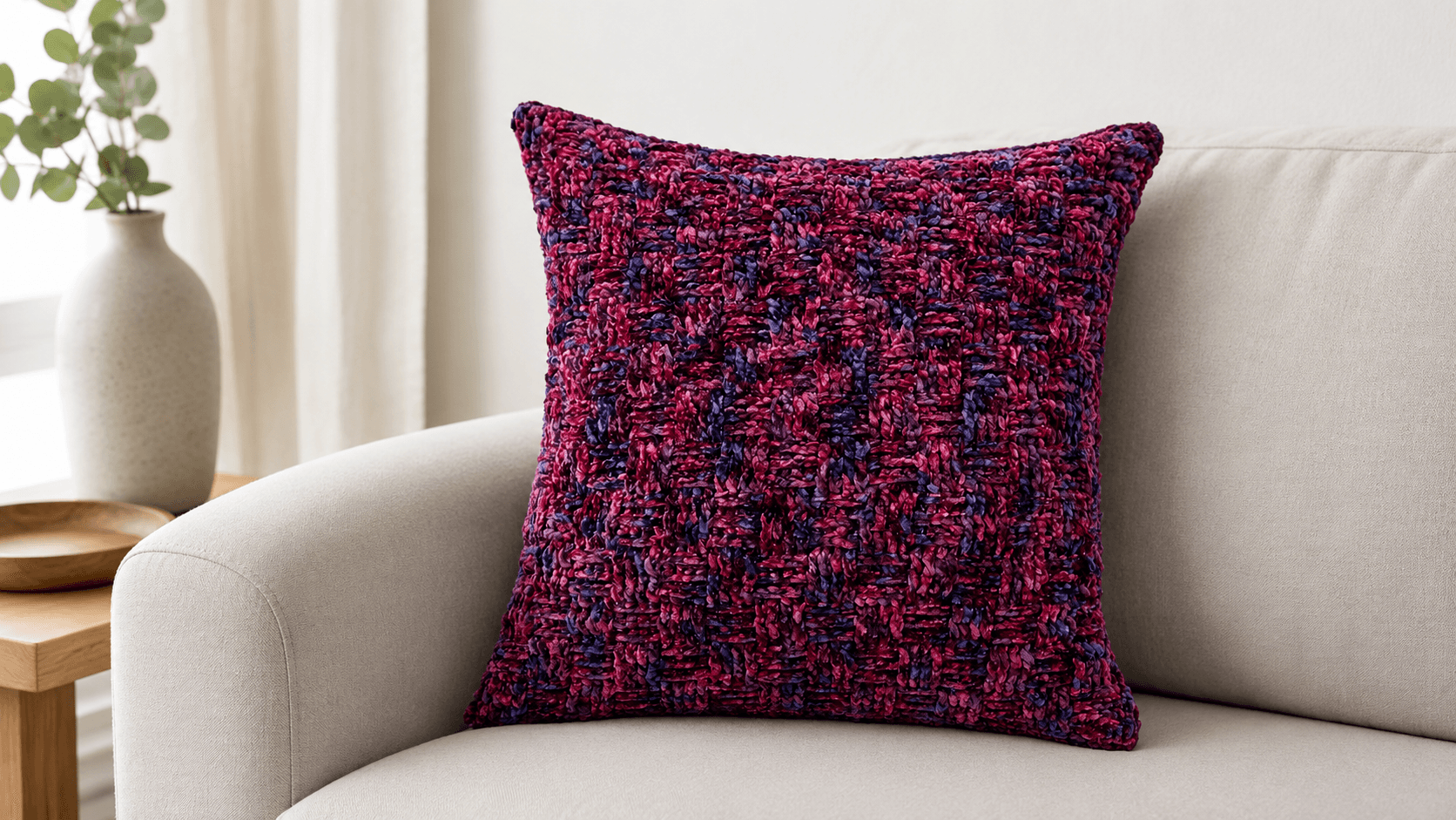 Pink and purple crochet basketweave textured pillow