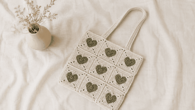 Cream and olive heart granny square tote bag flat lay