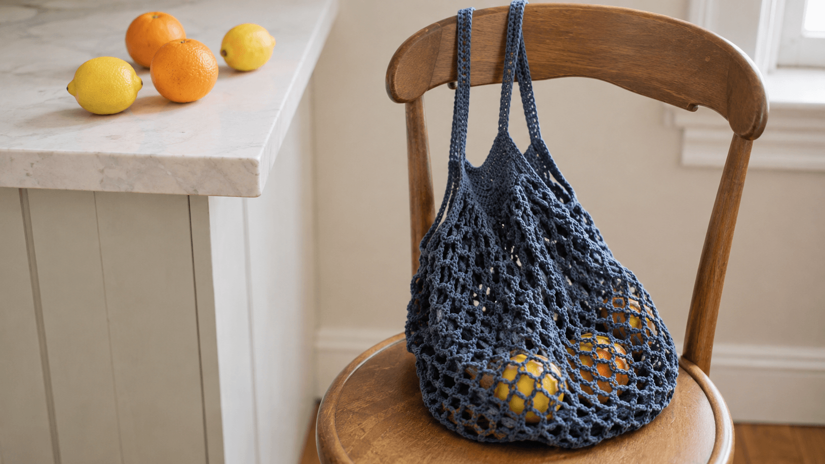 Navy mesh crochet market tote with lemons and oranges