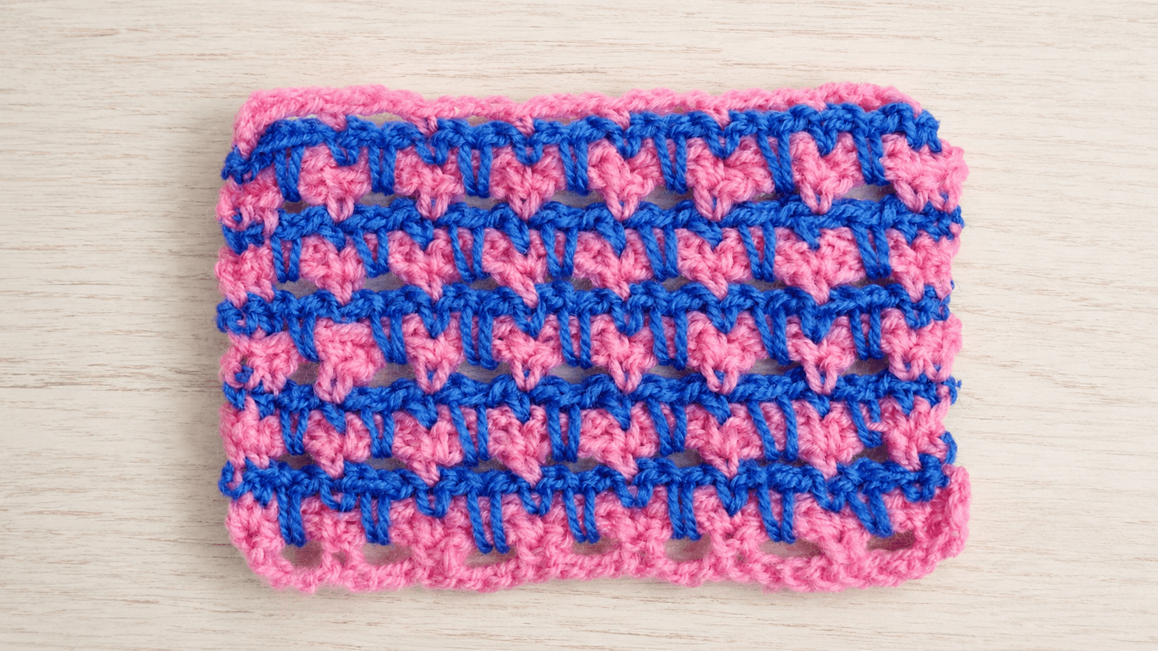 Pink and blue crochet spike stitch textured swatch