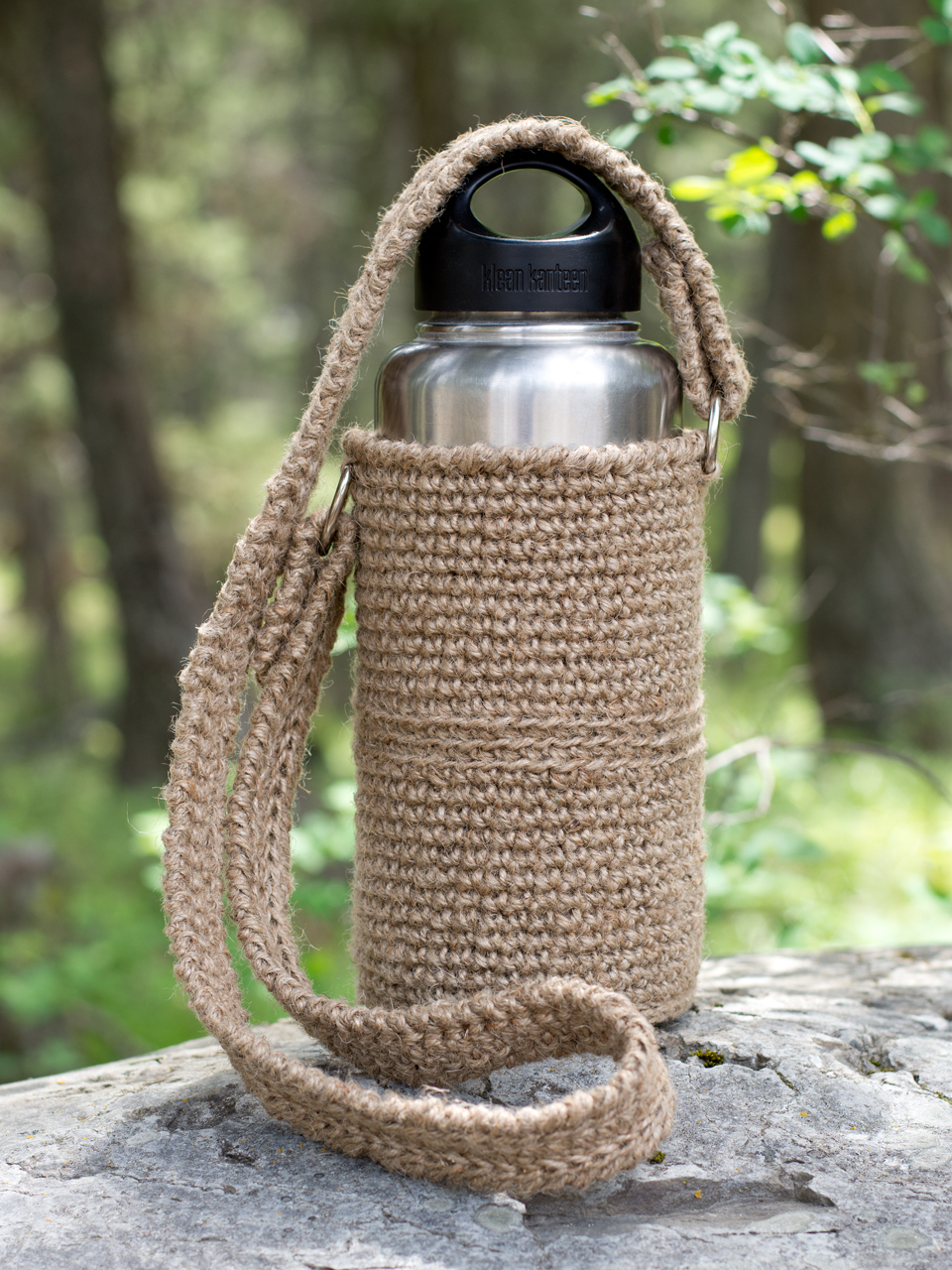 Tan jute crochet water bottle holder with crossbody strap